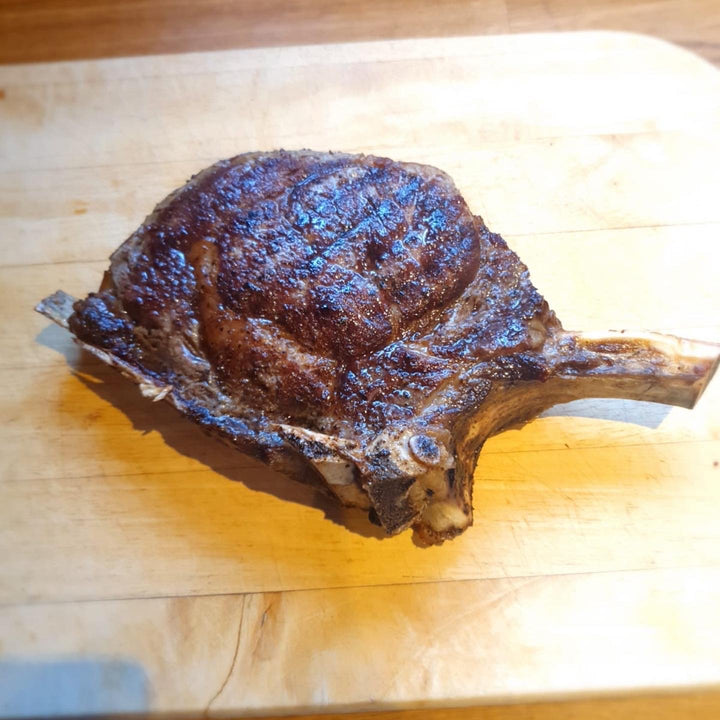 A cooked David Moore's côte de boeuf steak.