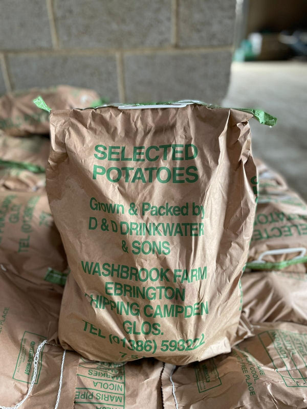 A brown paper bag labeled 'Selected Potatoes Grown & Packed by D&D Drinkwater & Sons, Washbrook Farm Ebrington Shippping Campden Glos.