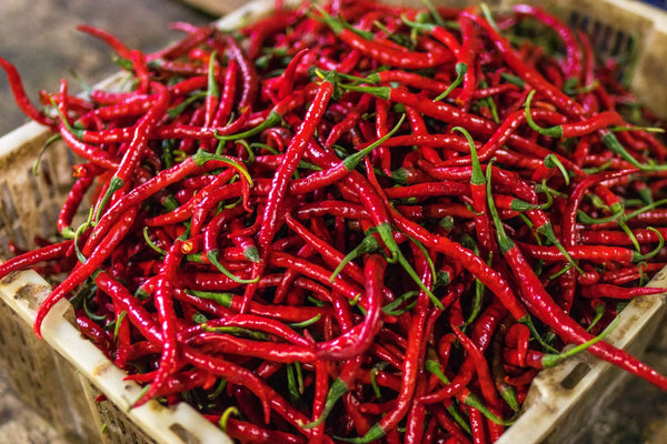 A big piles of red chillies.