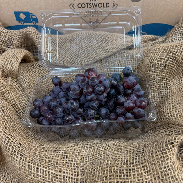 A punnet of red grapes.