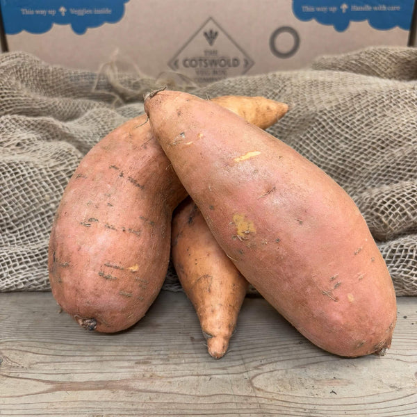 A trio of sweet potatoes.