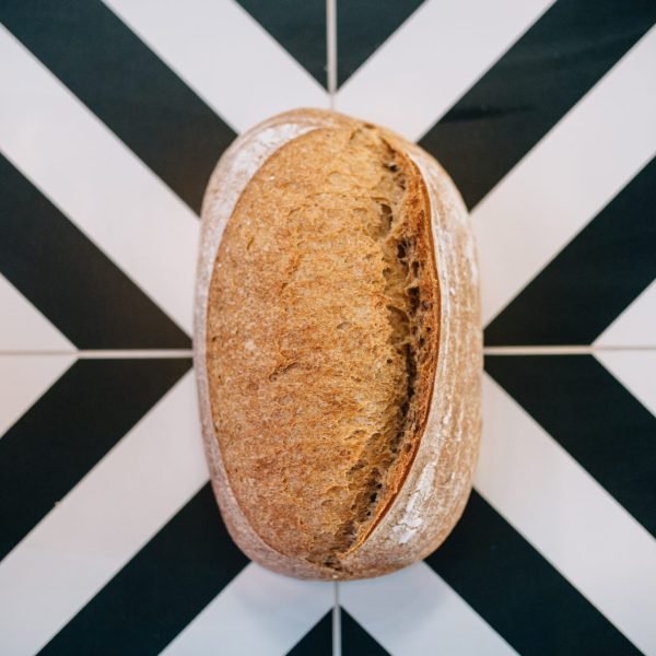 A white Country Sourdough loaf.